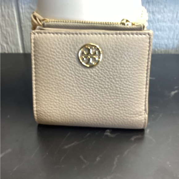 Tory Burch Handbags - Tory Burch Tan Wallet with Gold Logo